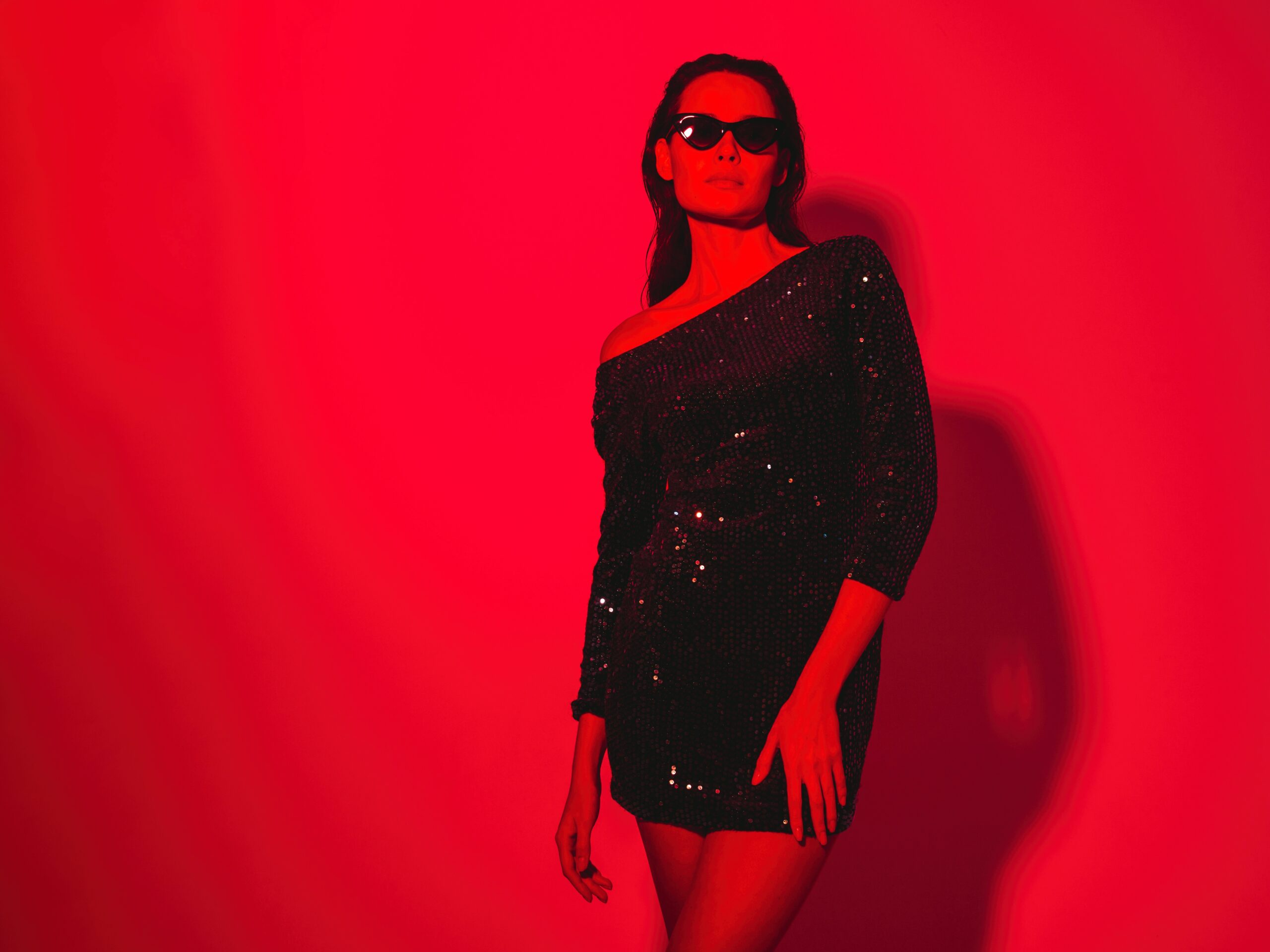 Young fashion woman posing in studio